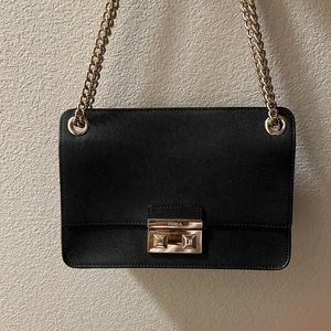 Brand new furla bag. Has several ways of wearing it and comes in original bag.